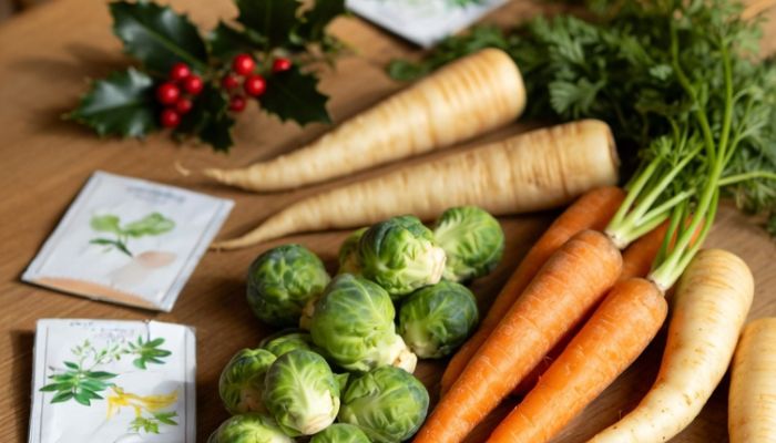 Christmas dinner vegetables including Brussels sprouts carrots and parsnips with seed packets - Grok Imagine