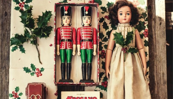 1930s children's Christmas gifts including tin soldiers Monopoly Meccano and a vintage doll - grokimagine