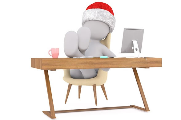 At desk considering Christmas buying