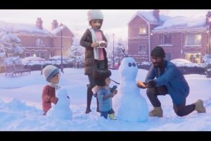 Disney Christmas 2021 - Mike and family building a snowman