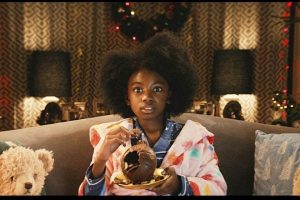 Tesco Christmas advert 2021- Girl With Free From Chocolate Smash Bauble